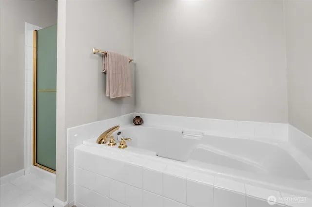 a view of a wooden deck and a yard