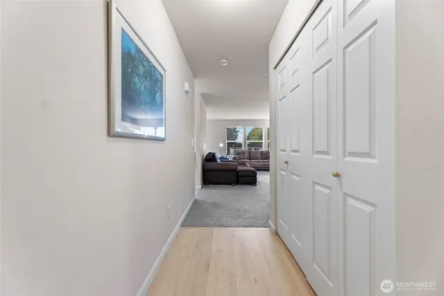 a view of a livingroom with furniture and an entryway