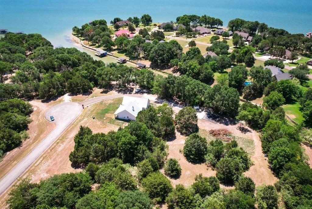 185 Cobalt Cove Corsicana, TX 75109 - Photo 4 of 10 an aerial view of residential house with yard and outdoor seating