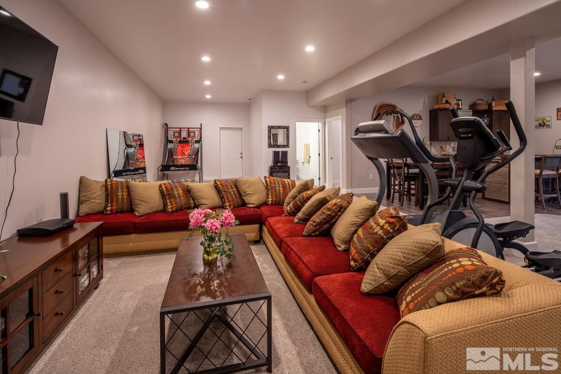4610 Tybo Road Reno, NV 89521 - Photo 23 of 40 a living room with furniture and a flat screen tv