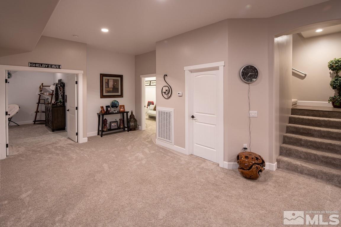 4610 Tybo Road Reno, NV 89521 - Photo 28 of 40 a view of a livingroom with furniture and a ceiling fan