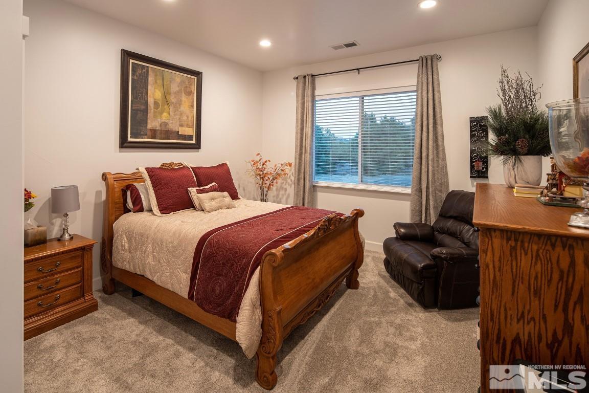 4610 Tybo Road Reno, NV 89521 - Photo 33 of 40 a bedroom with a bed and a couch