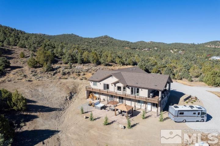 4610 Tybo Road Reno, NV 89521 - Photo 38 of 40 a view of a house with a mountain in the background