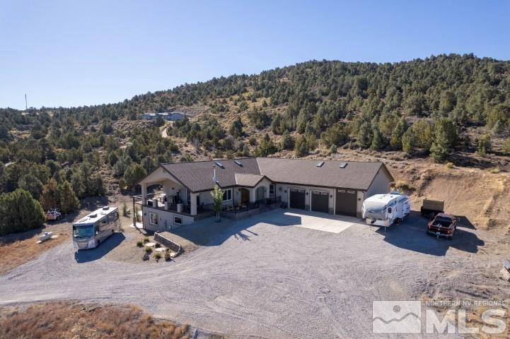 4610 Tybo Road Reno, NV 89521 - Photo 39 of 40 an aerial view of a house with swimming pool and mountain view
