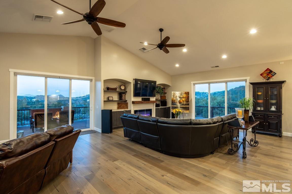 4610 Tybo Road Reno, NV 89521 - Photo 5 of 40 a living room with furniture and a flat screen tv