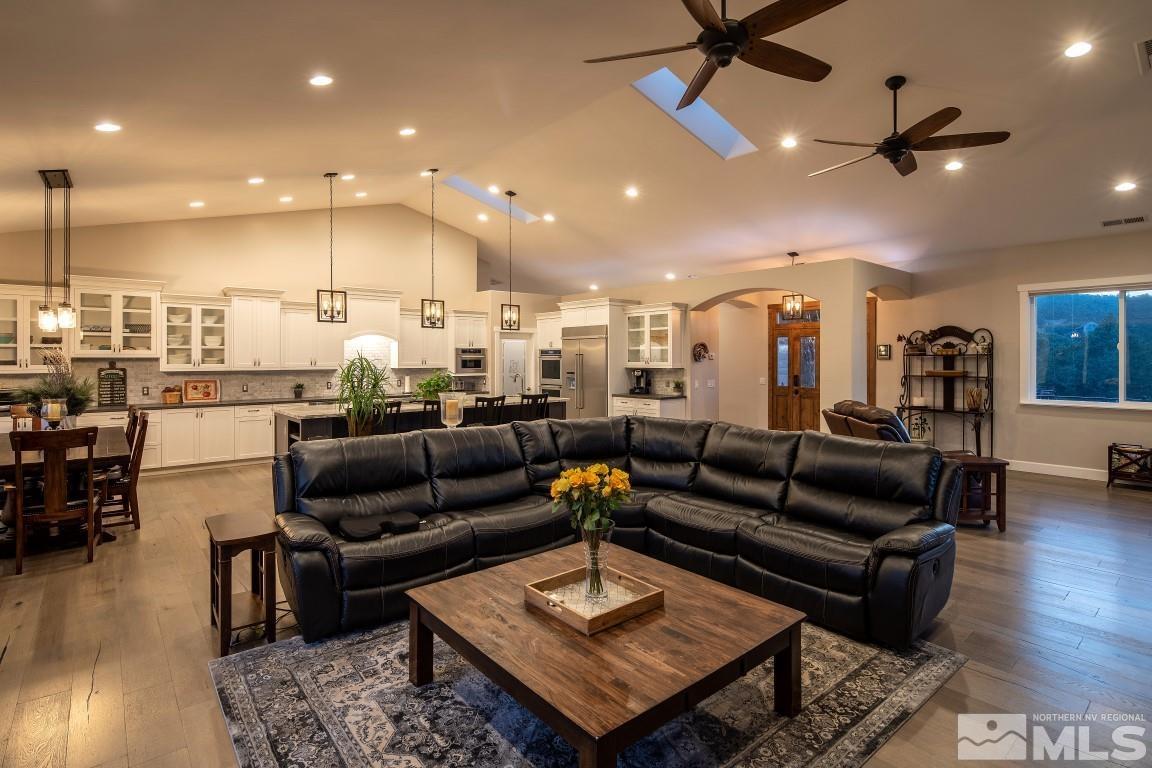 4610 Tybo Road Reno, NV 89521 - Photo 7 of 40 a living room with furniture and kitchen view