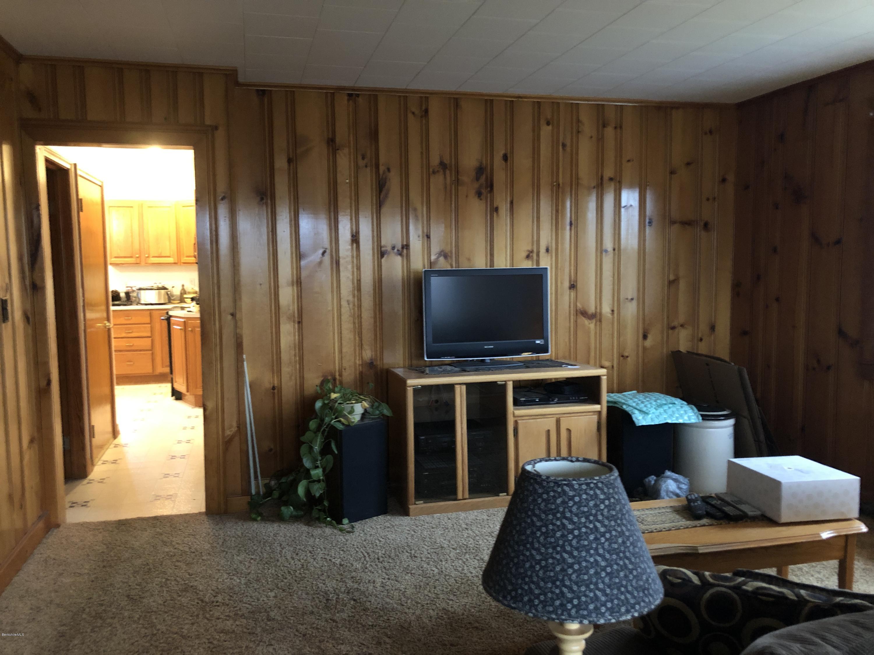 235 East Road Adams, MA 01220 - Photo 9 of 15 a living room with furniture and a flat screen tv