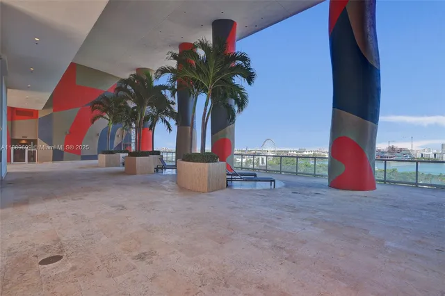 a view of a house with a yard and a garage
