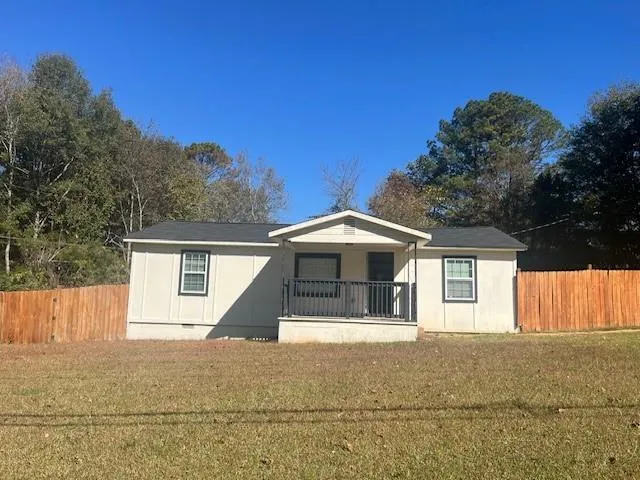 a front view of a house with a garage