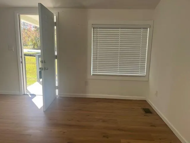 a view of swimming pool with a patio