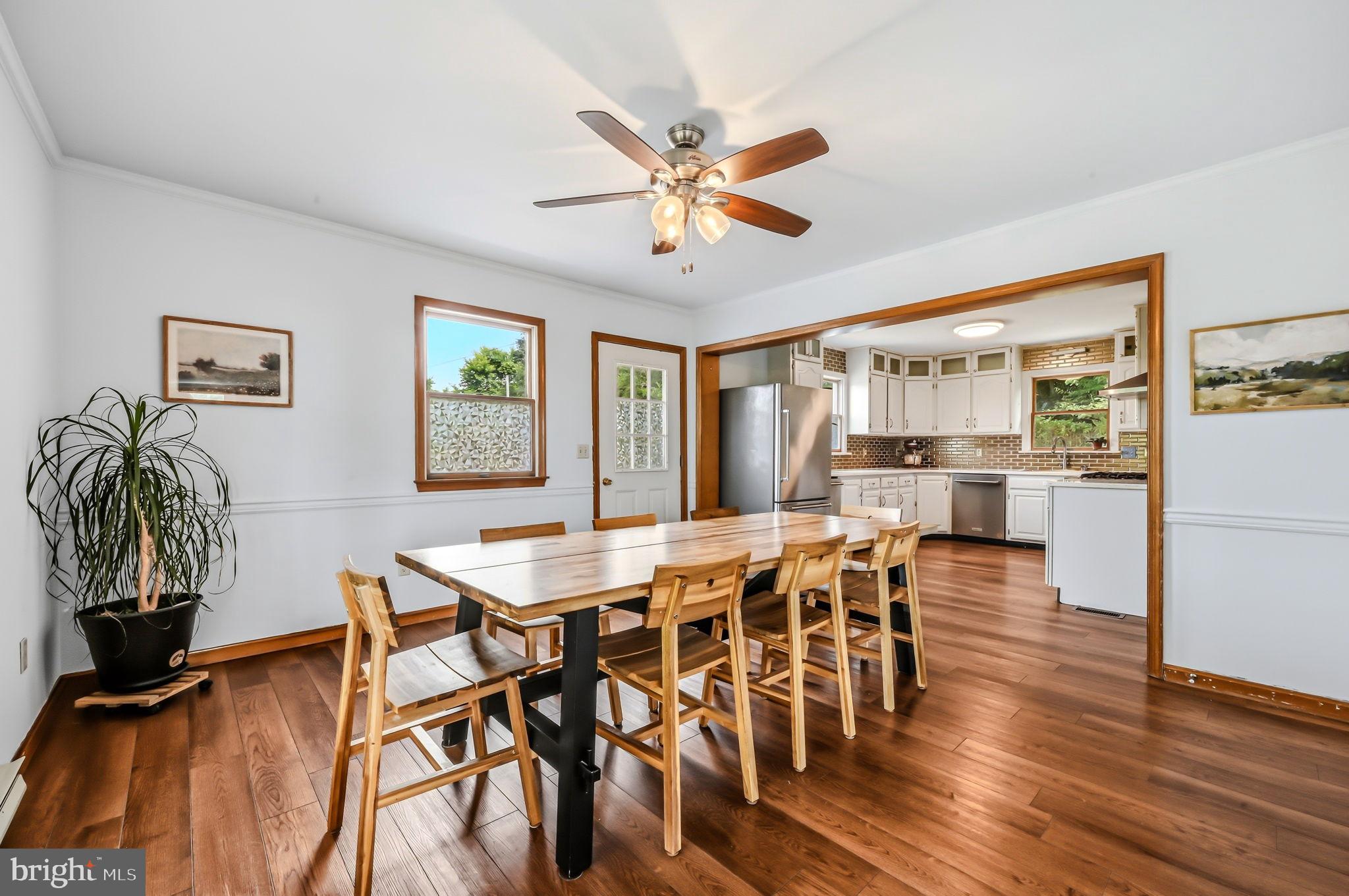 210 Elk View Road North East, MD 21901 - Photo 11 of 64 a view of a dining room with furniture and wooden floor