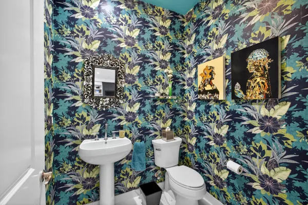 a view of multiple houses with a street