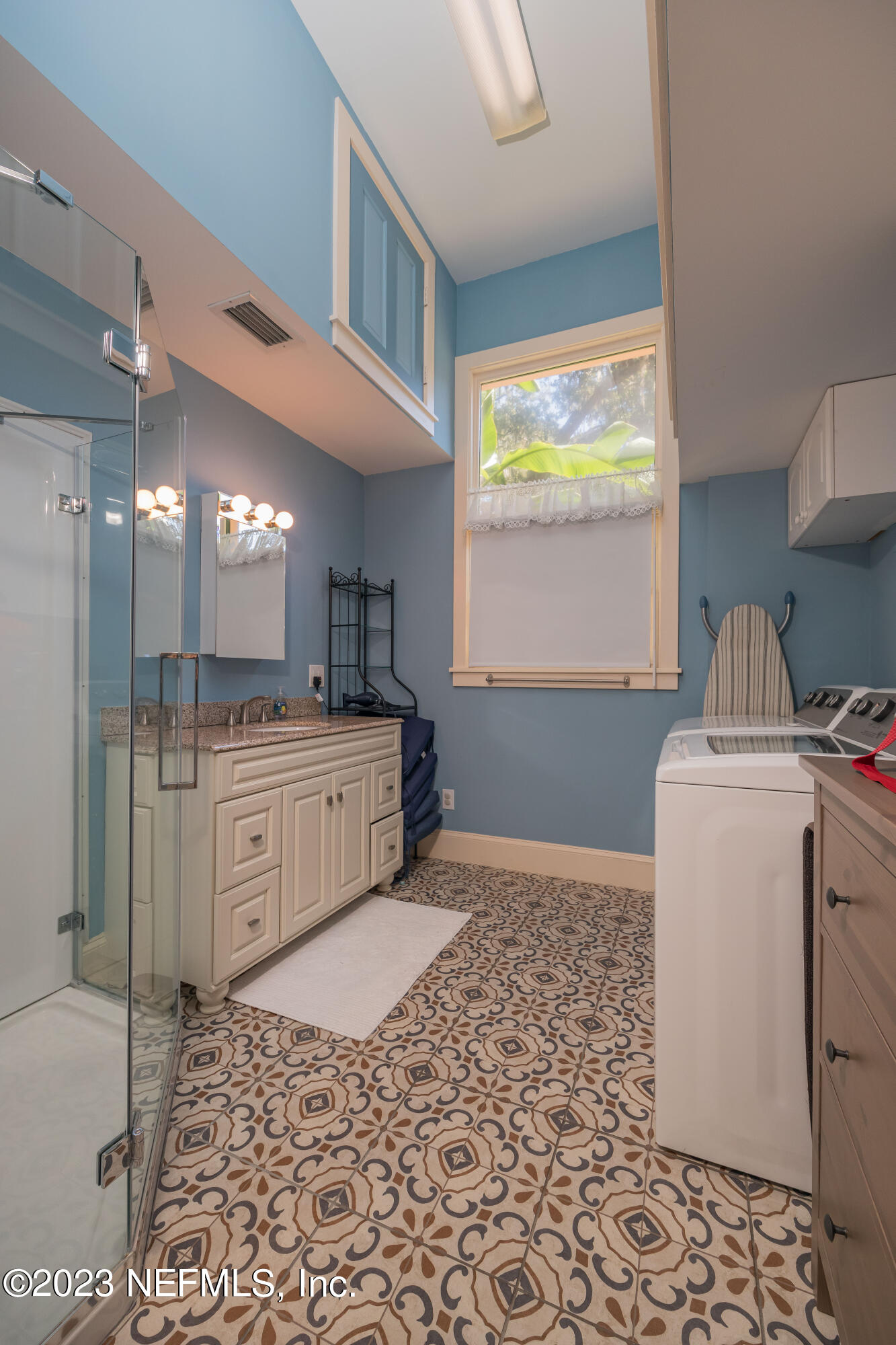 16 May Street St. Augustine, FL 32084 - Photo 32 of 86 a bathroom with a sink a toilet and a bathtub