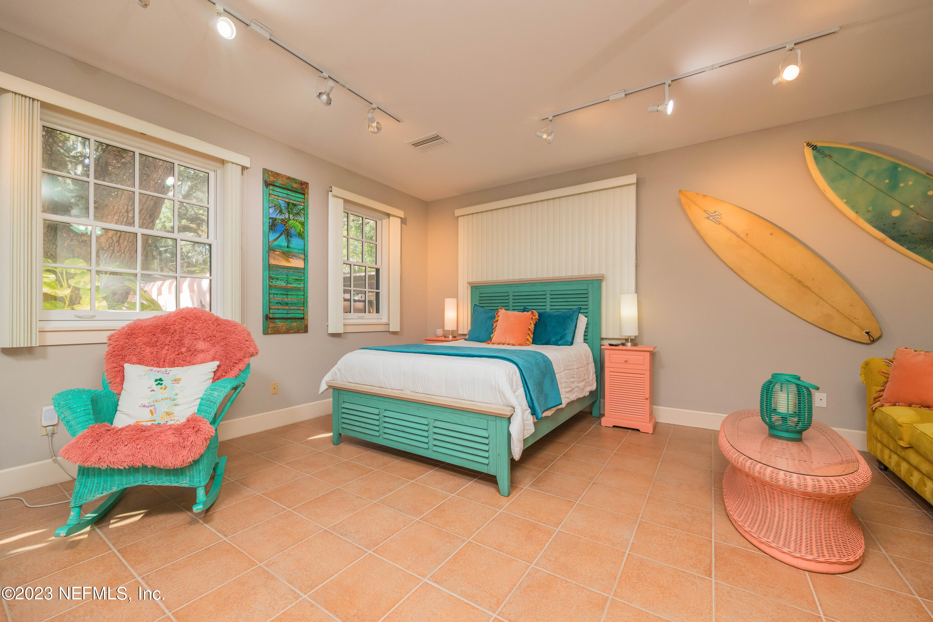 16 May Street St. Augustine, FL 32084 - Photo 38 of 86 a bedroom with a bed and a potted plant