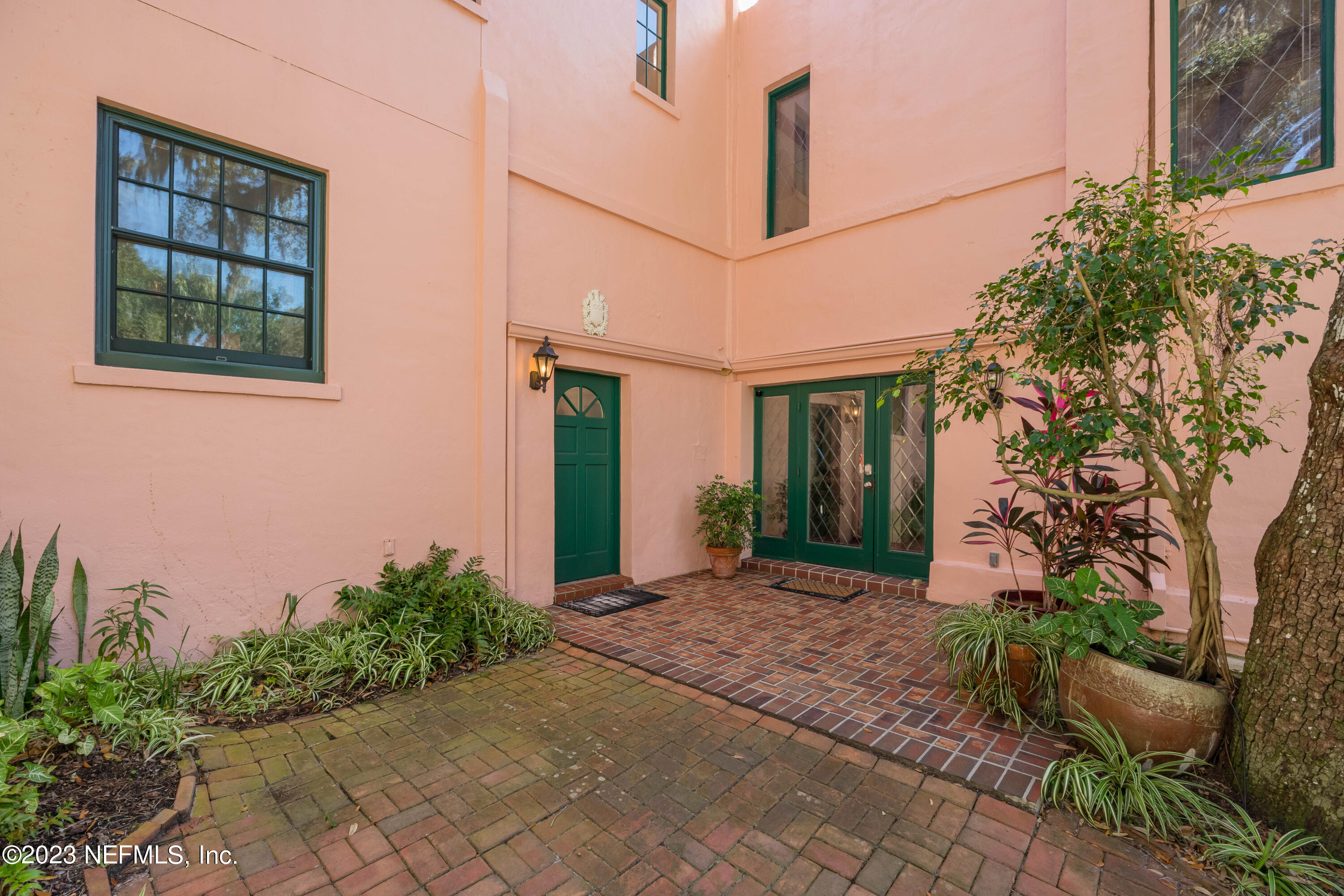 16 May Street St. Augustine, FL 32084 - Photo 4 of 86 a front view of a house having yard