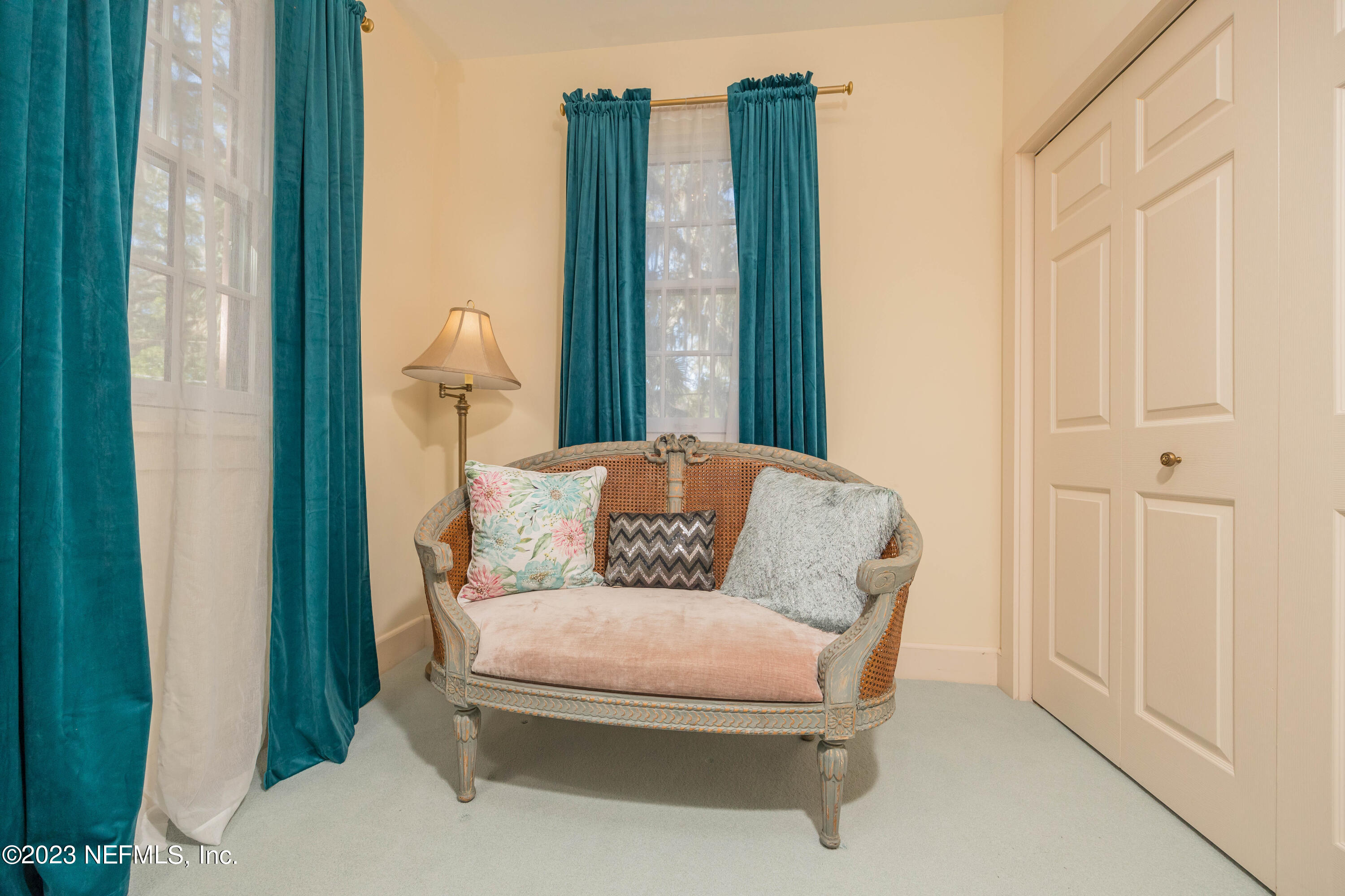 16 May Street St. Augustine, FL 32084 - Photo 46 of 86 a living room with furniture and a large window