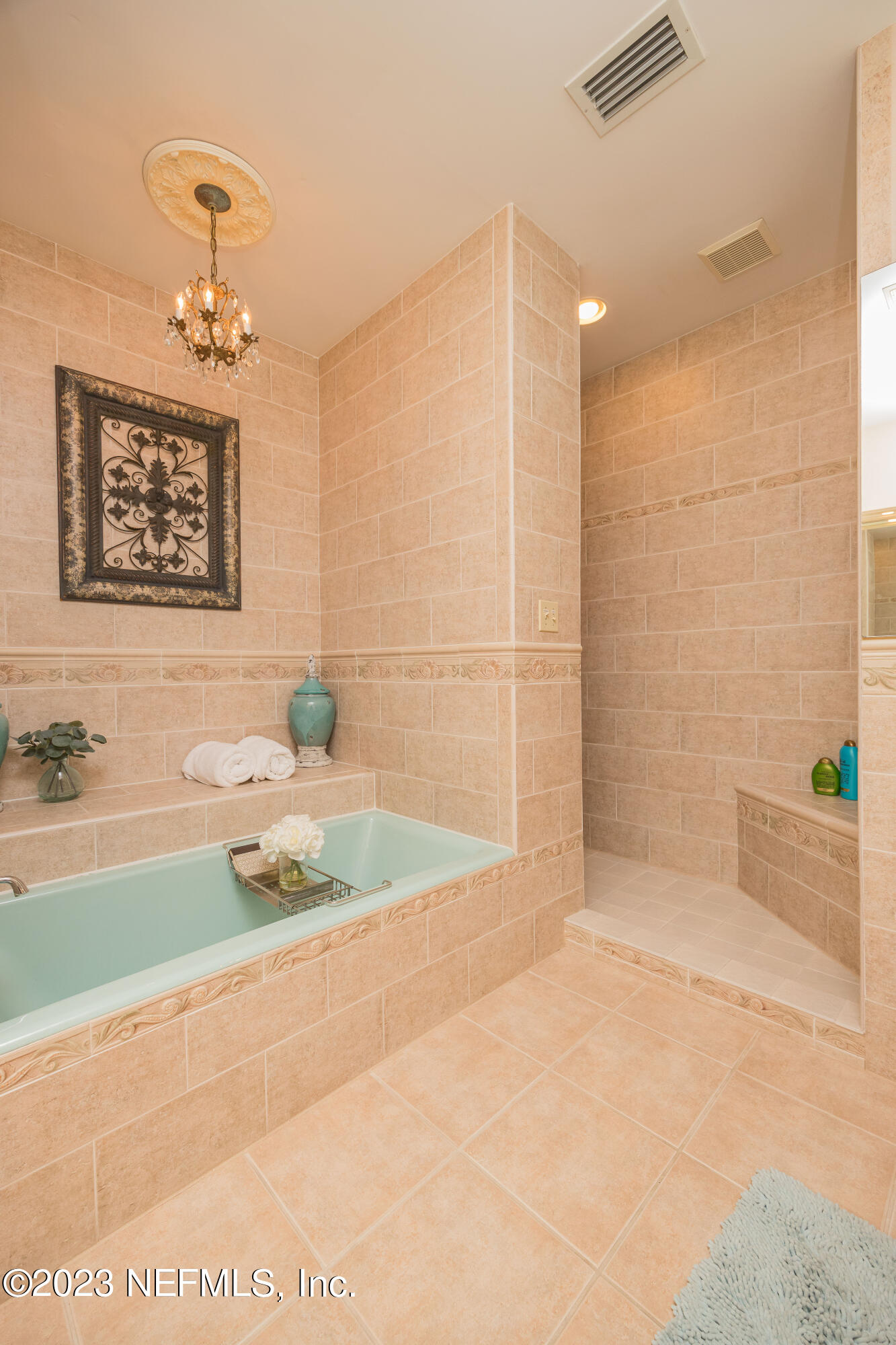 16 May Street St. Augustine, FL 32084 - Photo 49 of 86 a bathroom with a bathtub and shower