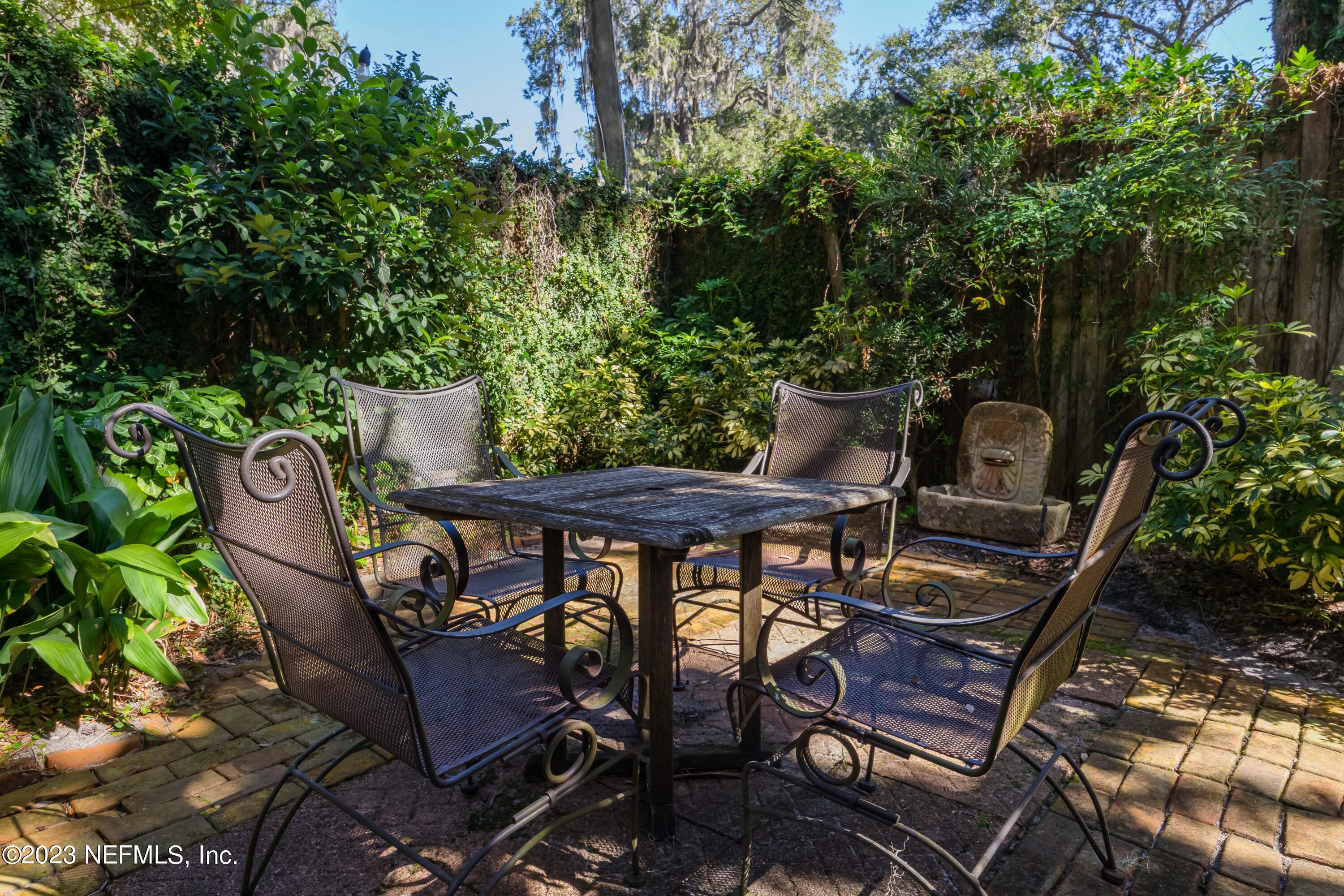 16 May Street St. Augustine, FL 32084 - Photo 73 of 86 a view of a chairs and table in the patio
