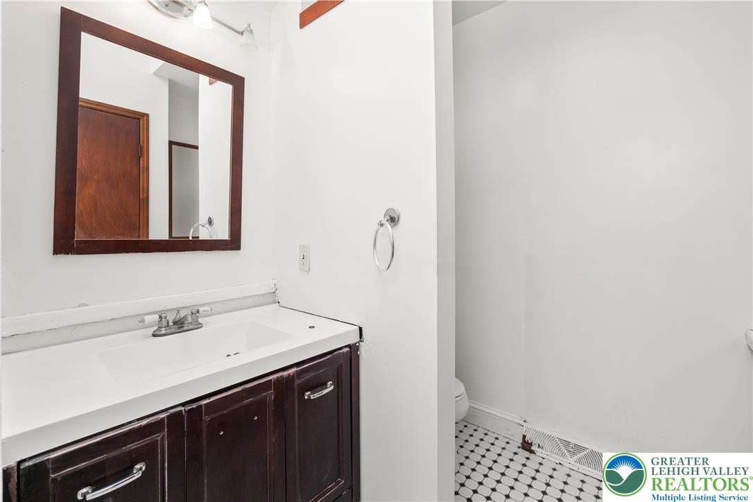 120 Royal Manor Road Easton, PA 18042 - Photo 24 of 49 a bathroom with a sink and a mirror