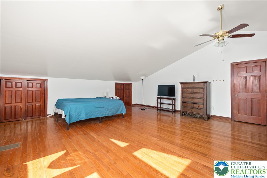 120 Royal Manor Road Easton, PA 18042 - Photo 33 of 49 a living room with furniture and a flat screen tv