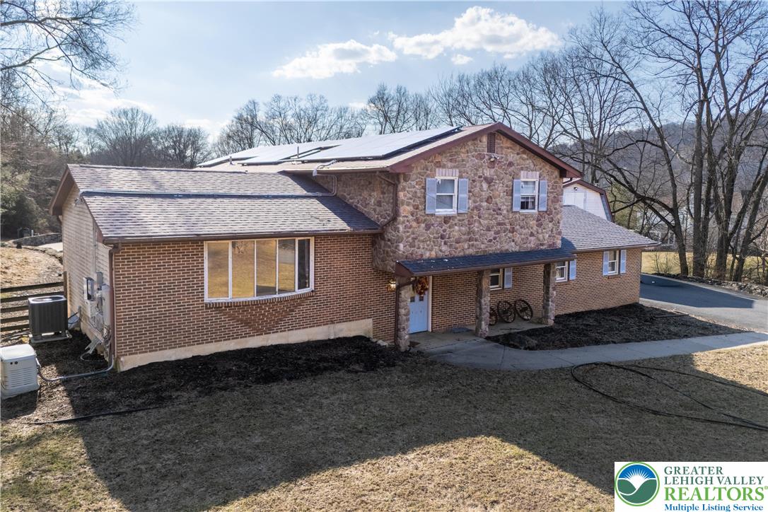 120 Royal Manor Road Easton, PA 18042 - Photo 47 of 49 a front view of a house with a yard