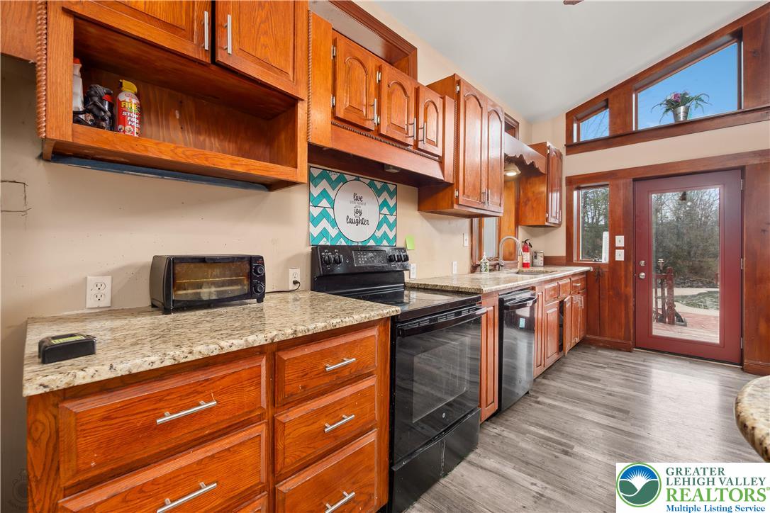 120 Royal Manor Road Easton, PA 18042 - Photo 10 of 49 a kitchen with stainless steel appliances granite countertop a stove and a sink