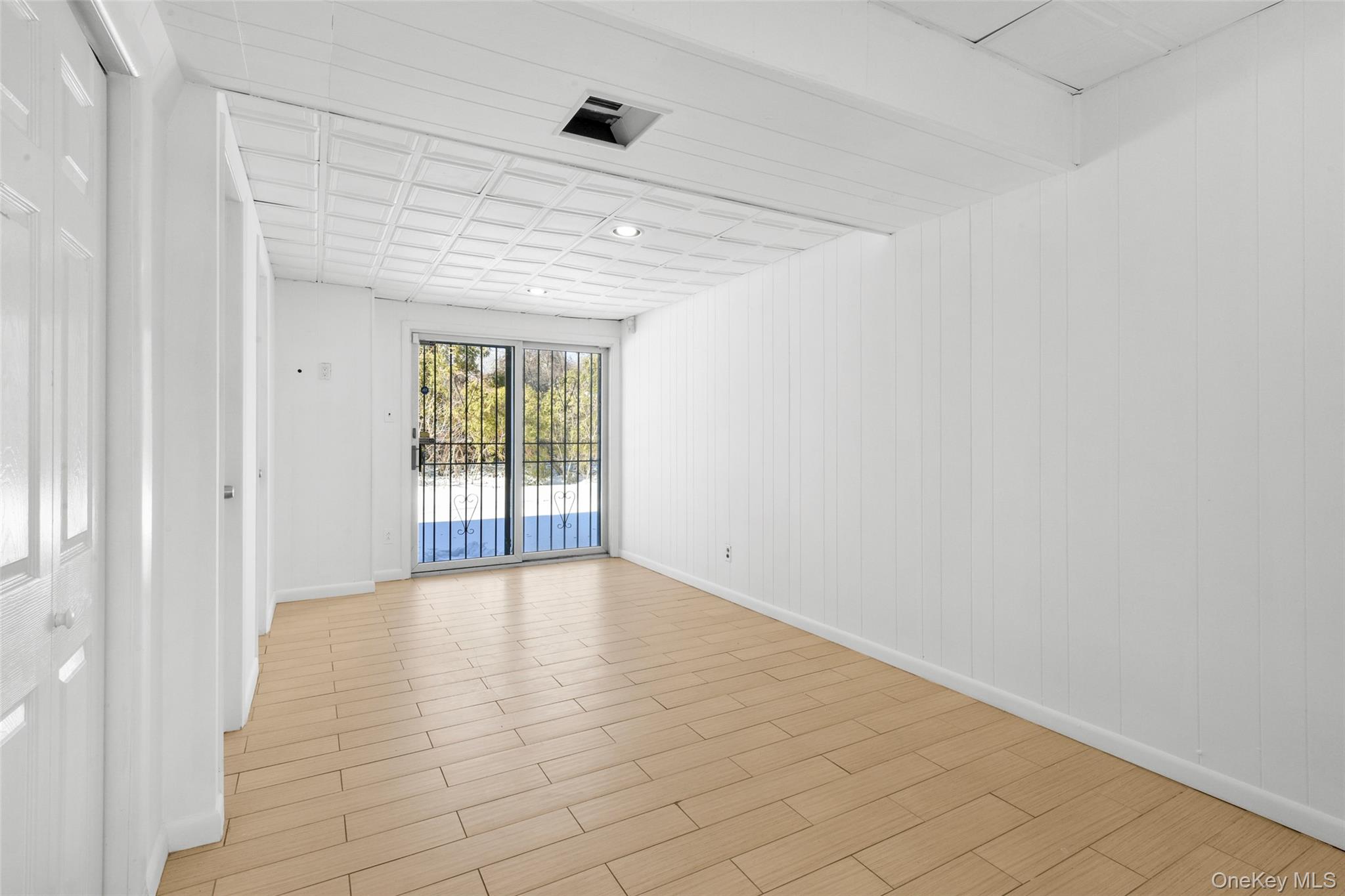 46 Harding Drive New Rochelle, NY 10801 - Photo 25 of 31 a view of an empty room with a window