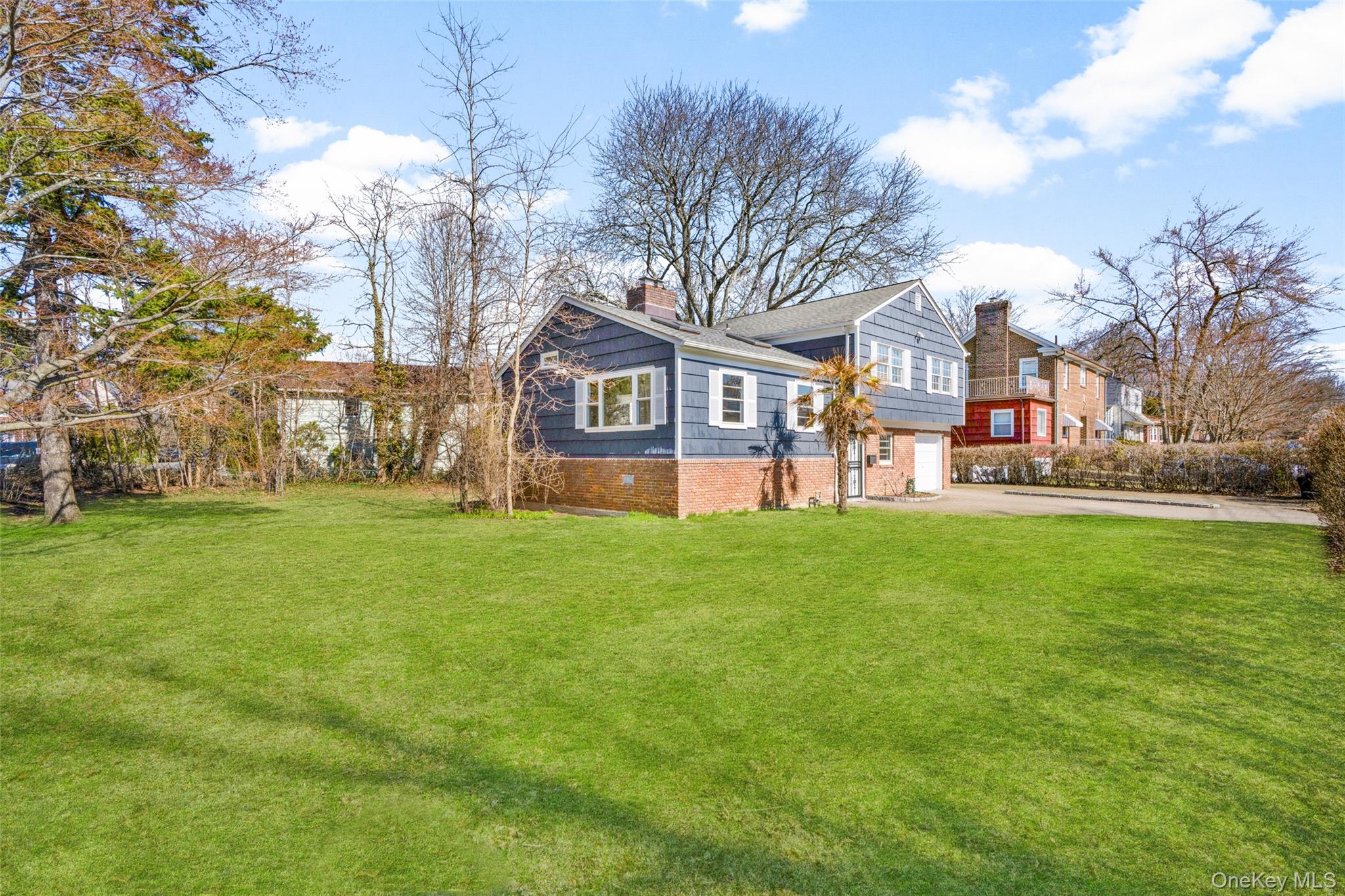 46 Harding Drive New Rochelle, NY 10801 - Photo 27 of 31 a front view of a building with garden