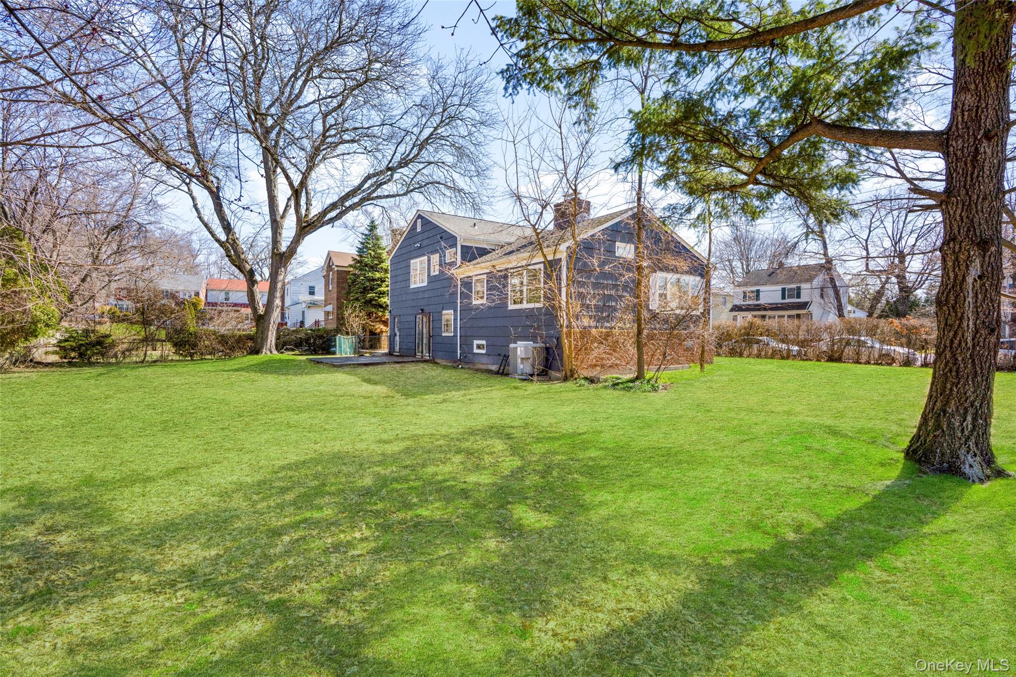 46 Harding Drive New Rochelle, NY 10801 - Photo 29 of 31 a view of a house with a yard