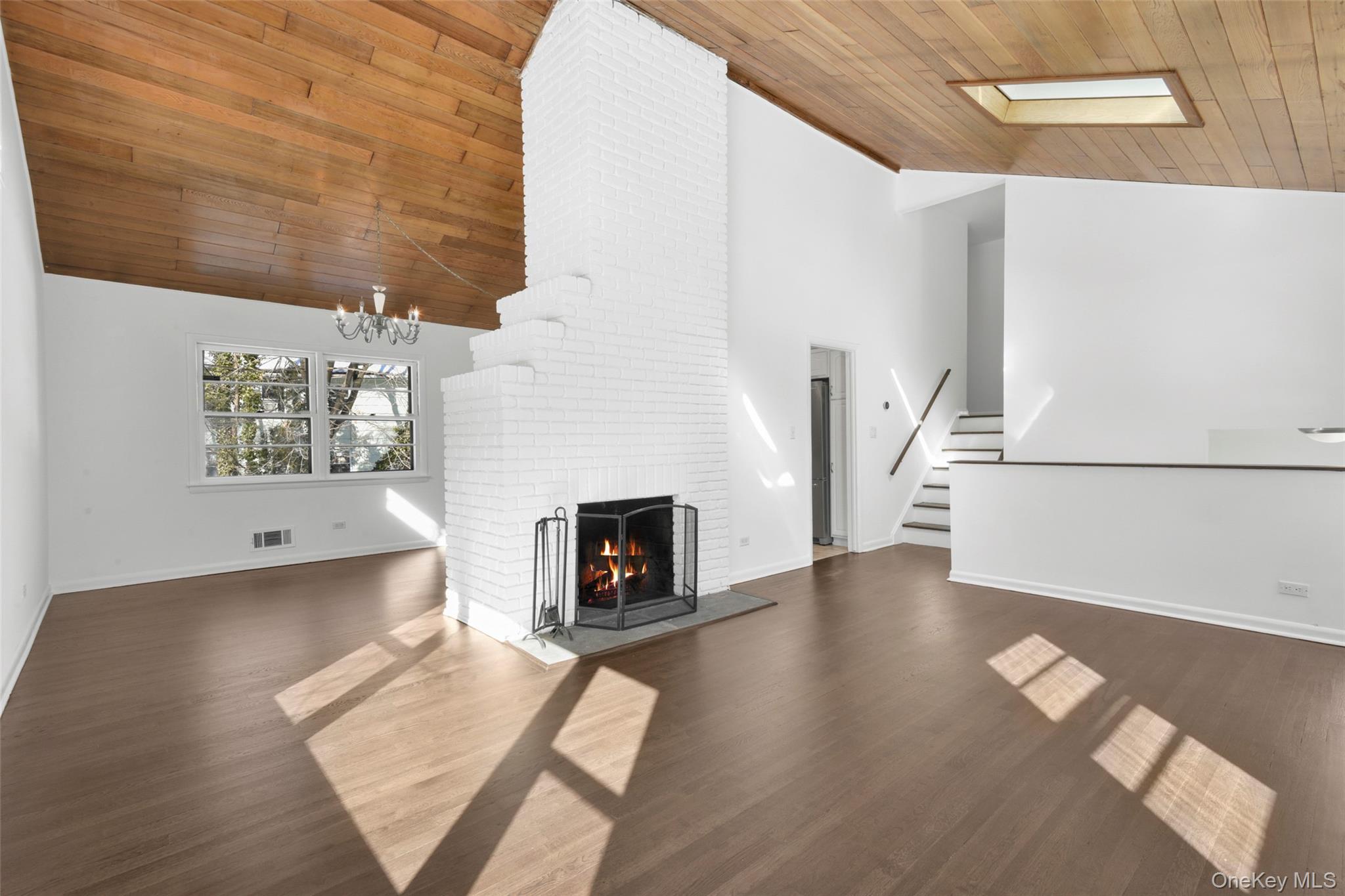 46 Harding Drive New Rochelle, NY 10801 - Photo 8 of 31 a view of a livingroom with furniture and a fireplace