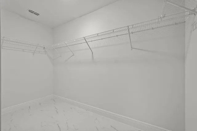 a view of a room with racks on the wall