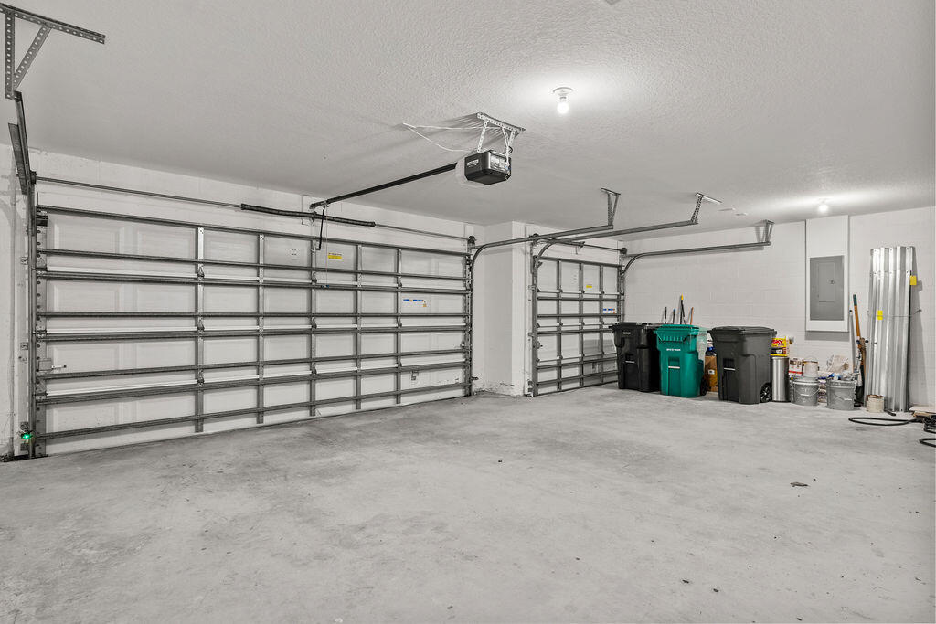 362 Northwest Bayshore Boulevard Port St. Lucie, FL 34983 - Photo 21 of 32 a view of a garage with furniture