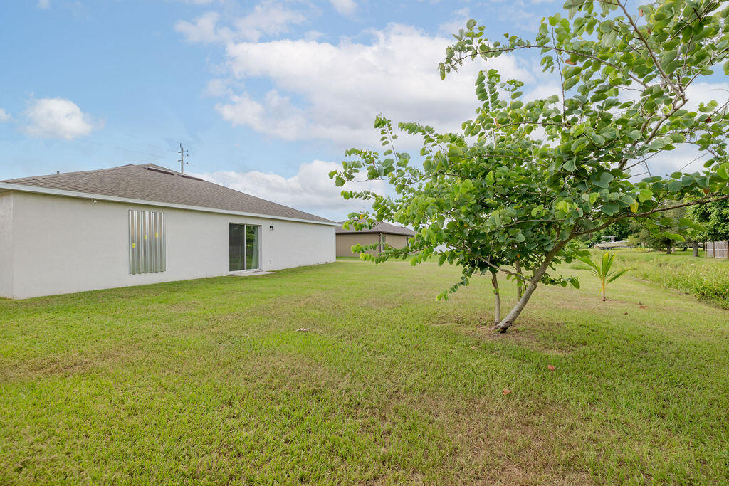362 Northwest Bayshore Boulevard Port St. Lucie, FL 34983 - Photo 27 of 32 a view of outdoor space and yard