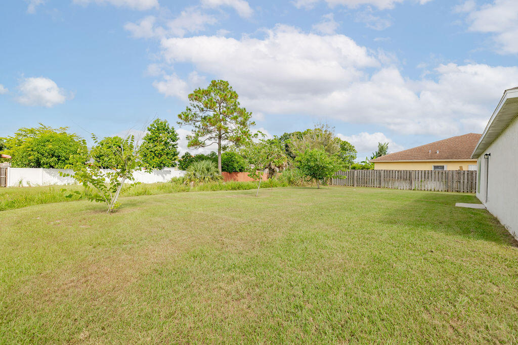 362 Northwest Bayshore Boulevard Port St. Lucie, FL 34983 - Photo 32 of 32 a view of an outdoor space and basketball court