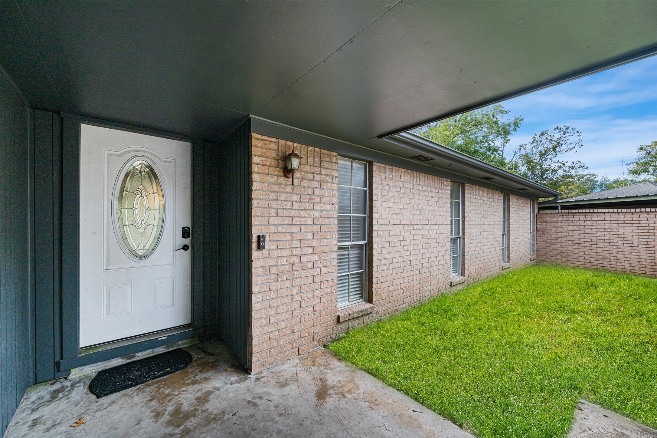 4205 Lariat Drive Baytown, TX 77521 - Photo 3 of 31 a backyard of a house with seating space