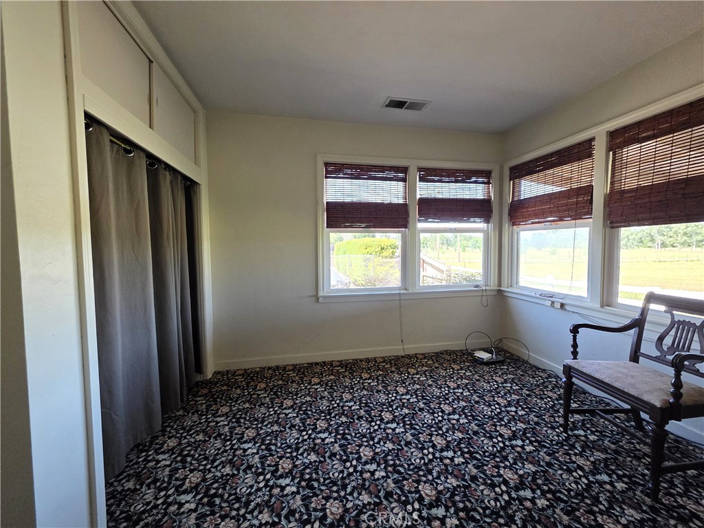 23773 River Road Corning, CA 96021 - Photo 16 of 64 wooden floor in an empty room with a window