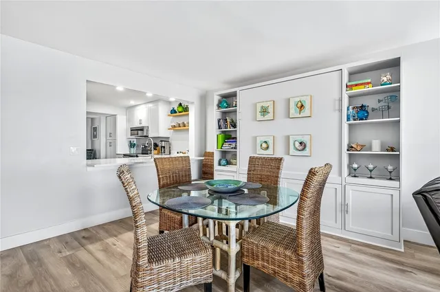 a view of a dining room with furniture