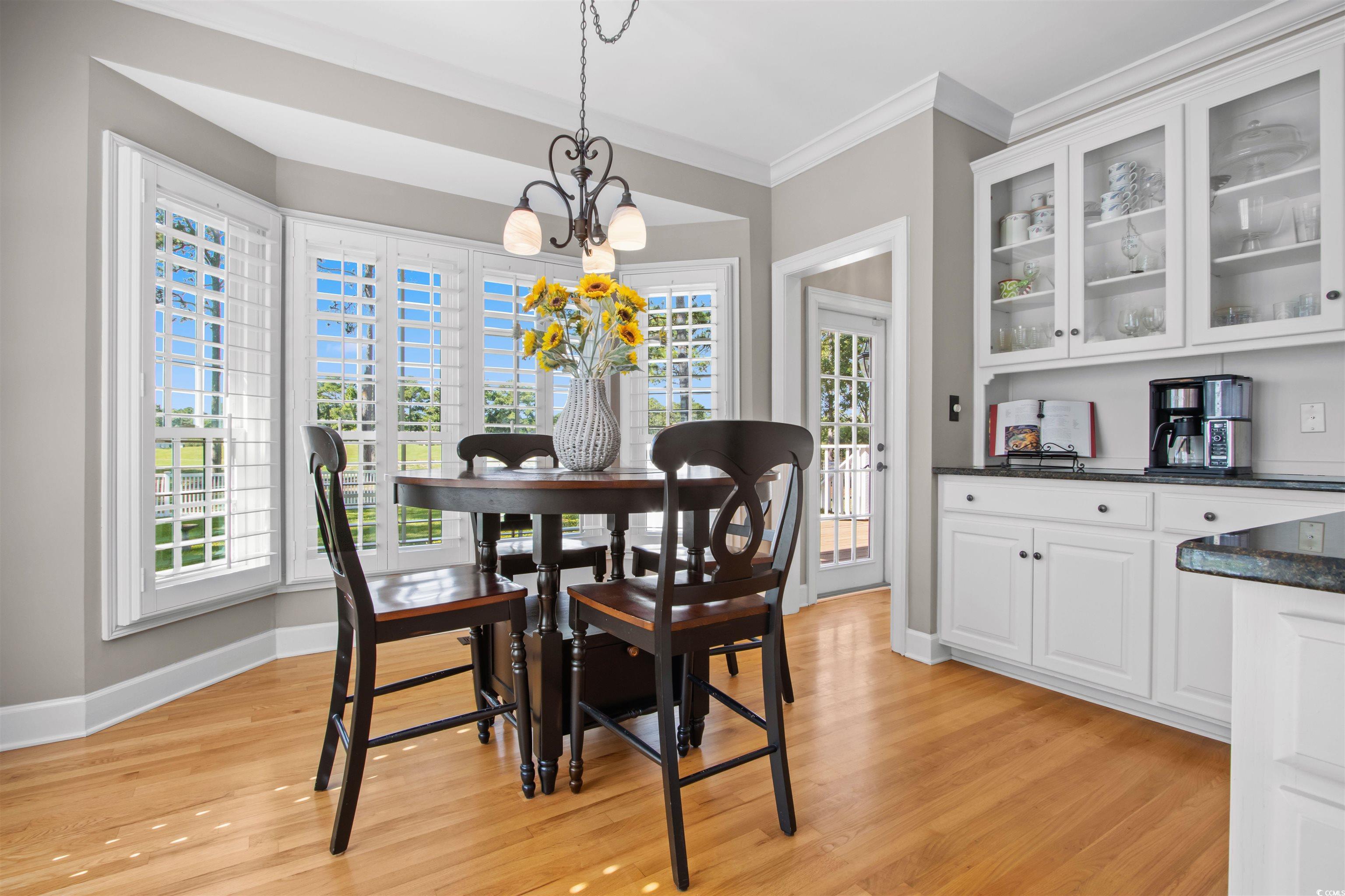 1035 Gullane Court Myrtle Beach, SC 29575 - Photo 13 of 40 Dining room featuring a notable chandelier, light