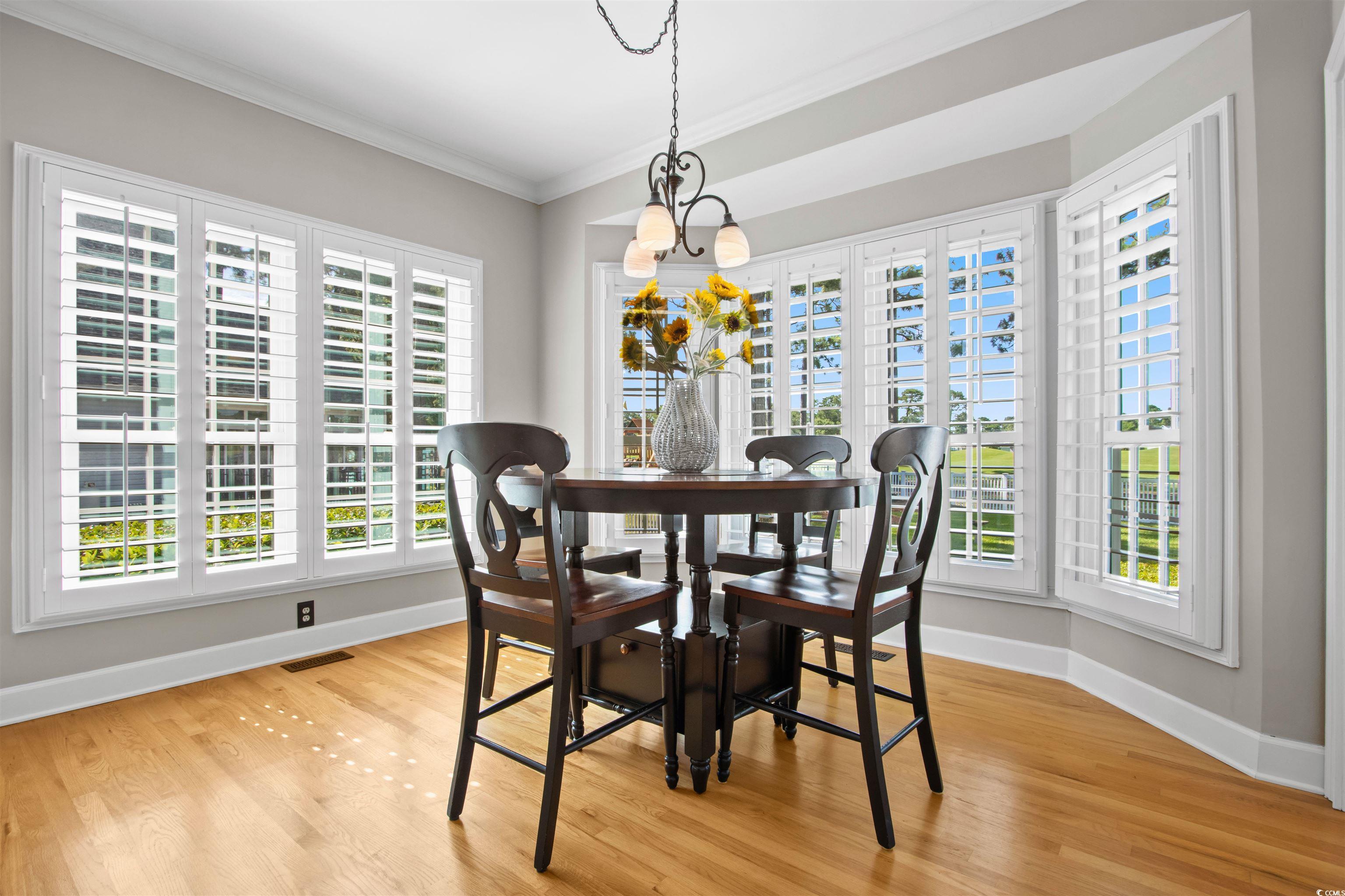 1035 Gullane Court Myrtle Beach, SC 29575 - Photo 14 of 40 Dining room featuring a healthy amount of sunlight