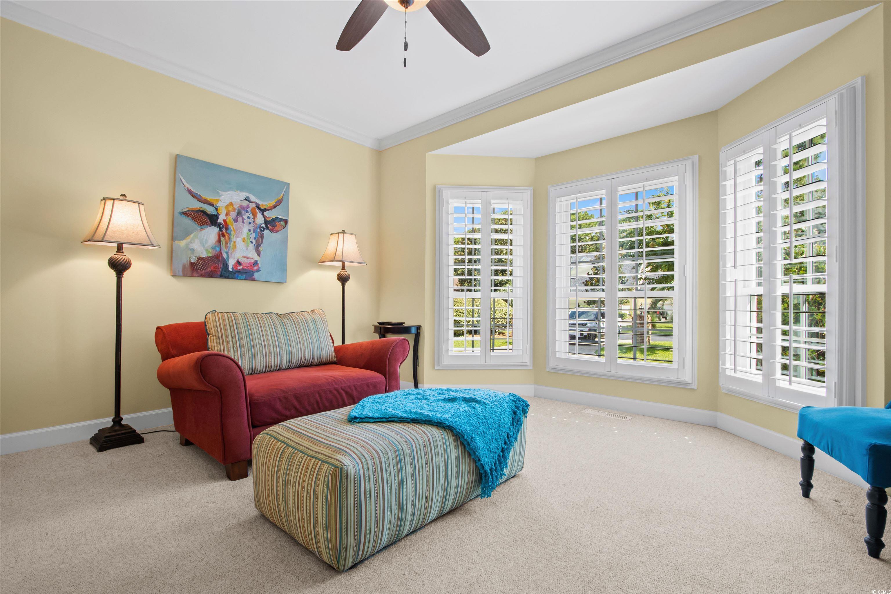 1035 Gullane Court Myrtle Beach, SC 29575 - Photo 16 of 40 Sitting room with ceiling fan, carpet flooring, an