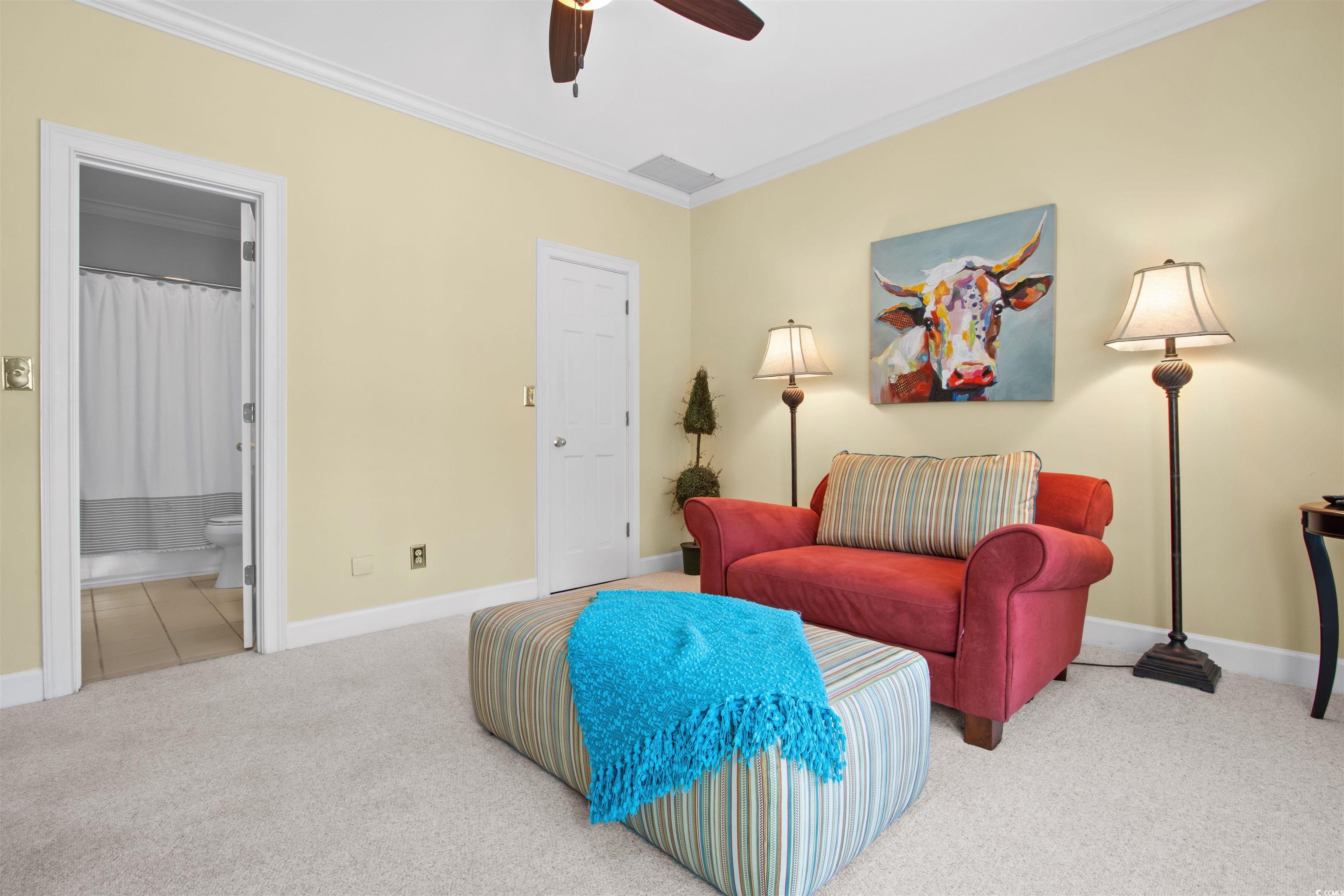 1035 Gullane Court Myrtle Beach, SC 29575 - Photo 17 of 40 Sitting room featuring ceiling fan, carpet floorin