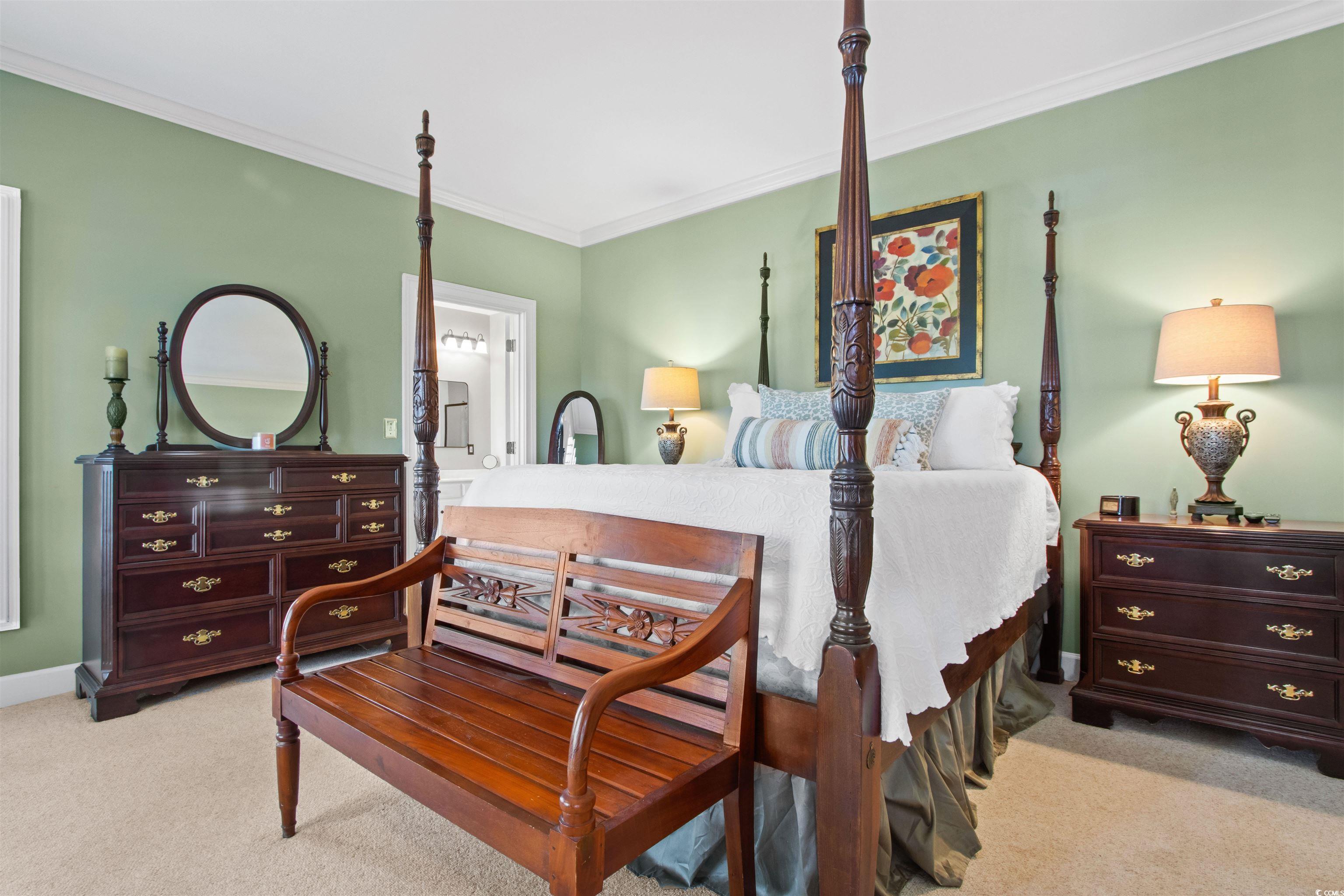 1035 Gullane Court Myrtle Beach, SC 29575 - Photo 20 of 40 Carpeted bedroom with ensuite bath and ornamental