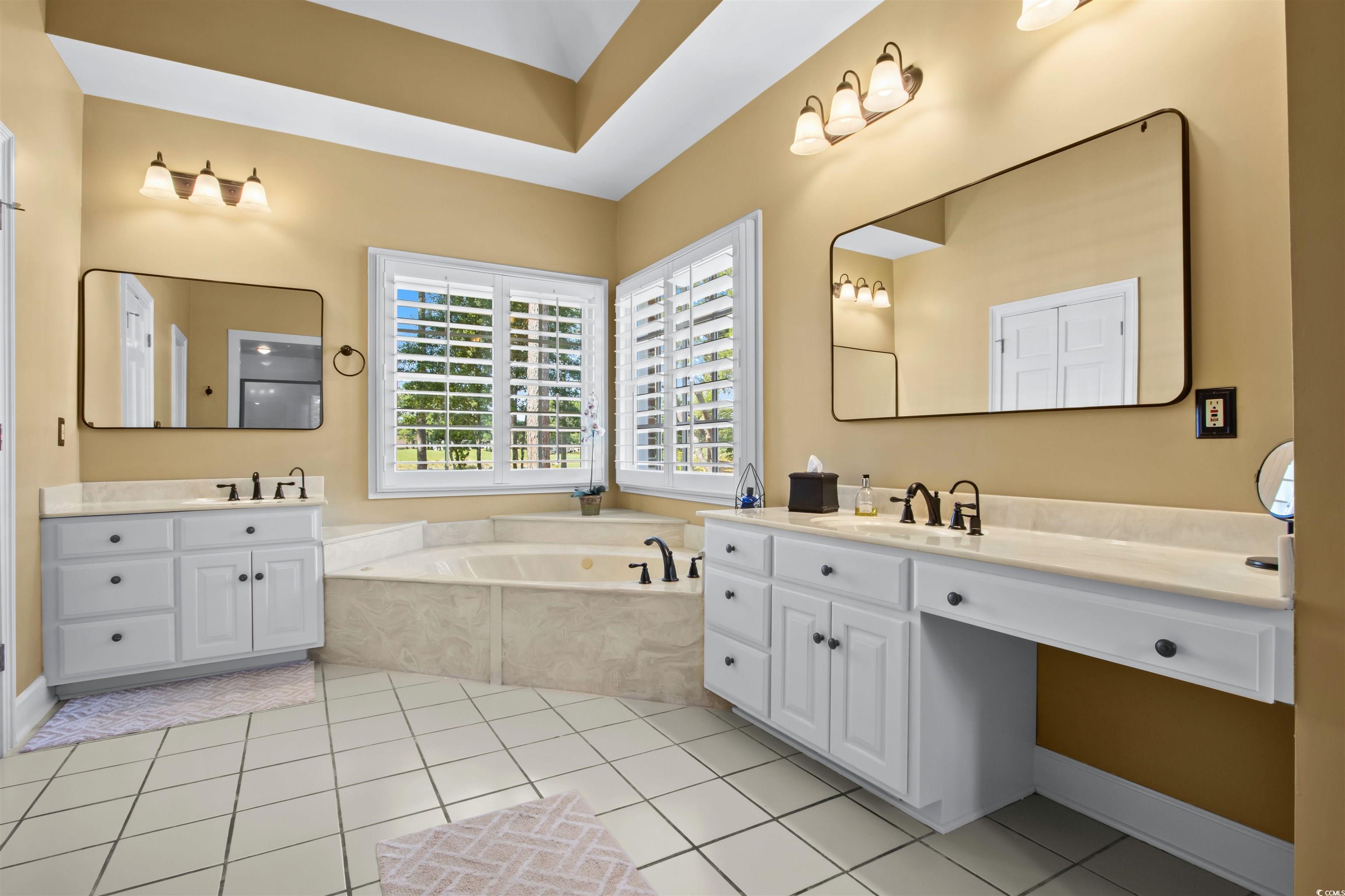 1035 Gullane Court Myrtle Beach, SC 29575 - Photo 23 of 40 Bathroom featuring tile patterned flooring, a bath