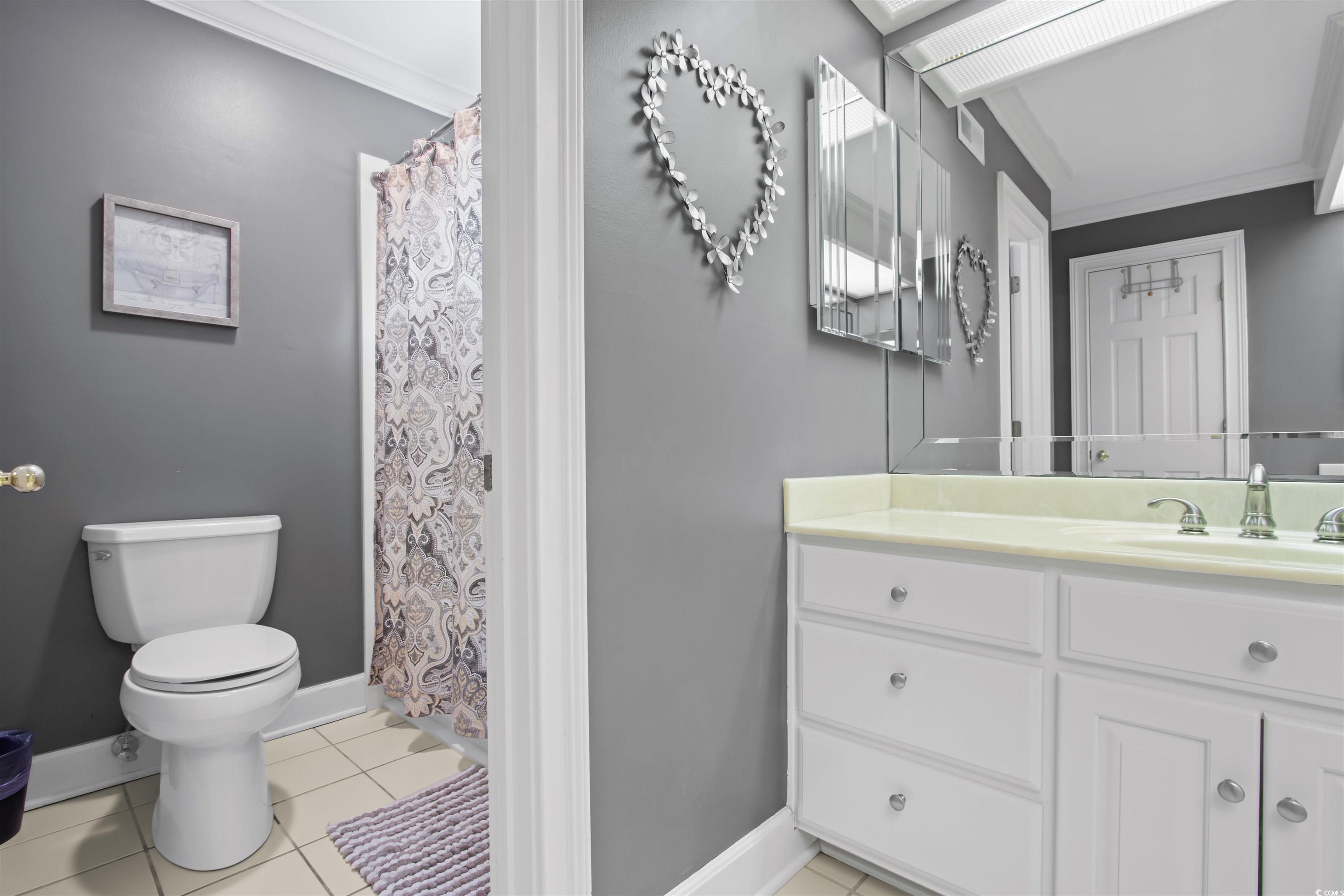 1035 Gullane Court Myrtle Beach, SC 29575 - Photo 27 of 40 Bathroom featuring tile patterned floors, crown mo