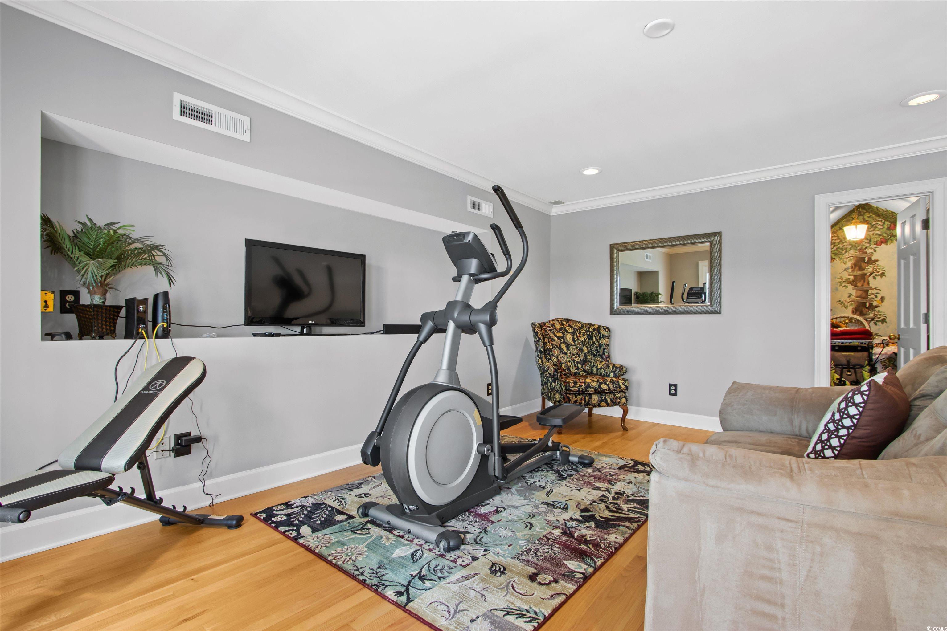 1035 Gullane Court Myrtle Beach, SC 29575 - Photo 32 of 40 Exercise area featuring hardwood / wood-style floo