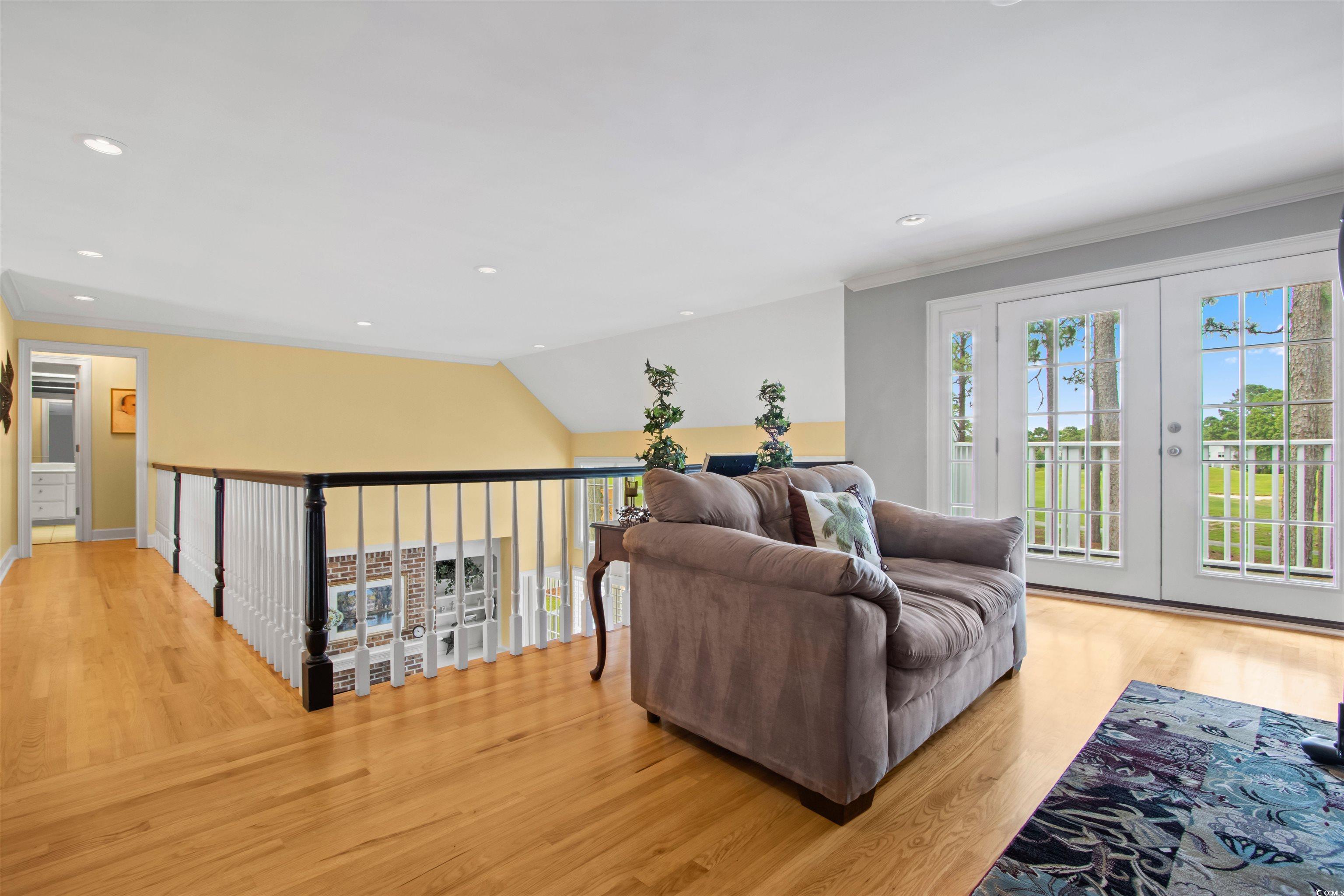 1035 Gullane Court Myrtle Beach, SC 29575 - Photo 33 of 40 Living room with light hardwood / wood-style floor