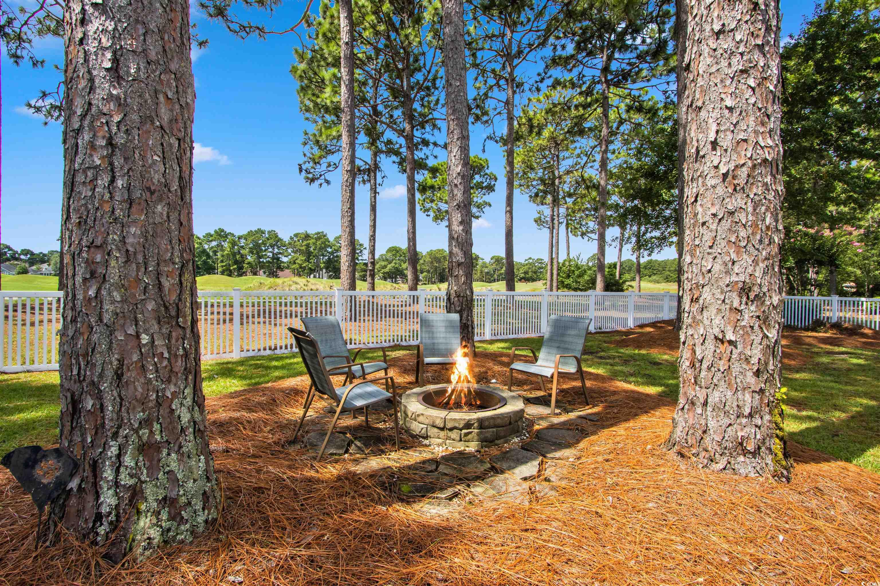 1035 Gullane Court Myrtle Beach, SC 29575 - Photo 37 of 40 View of yard featuring an outdoor fire pit