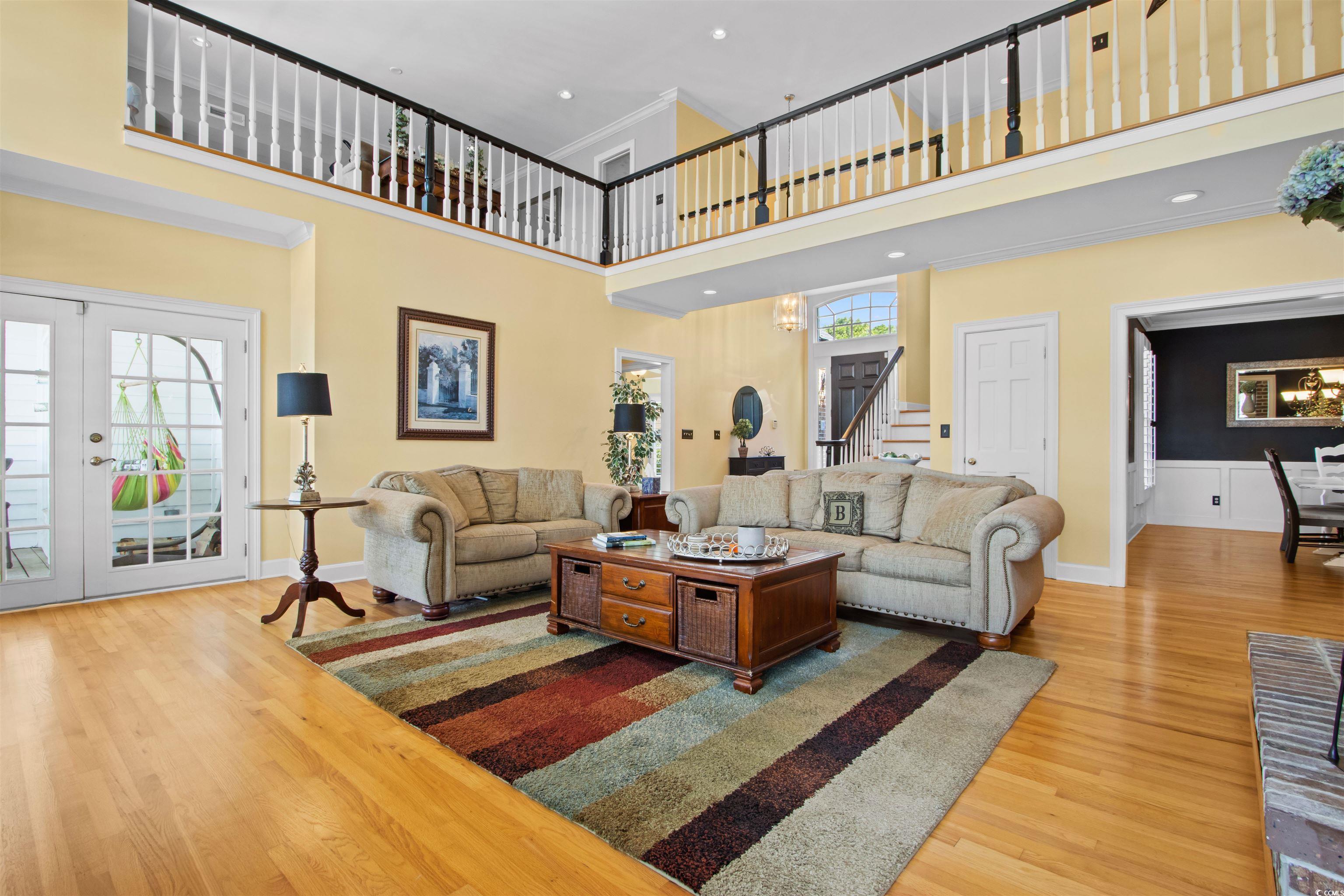 1035 Gullane Court Myrtle Beach, SC 29575 - Photo 7 of 40 Living room with light wood-type flooring, french