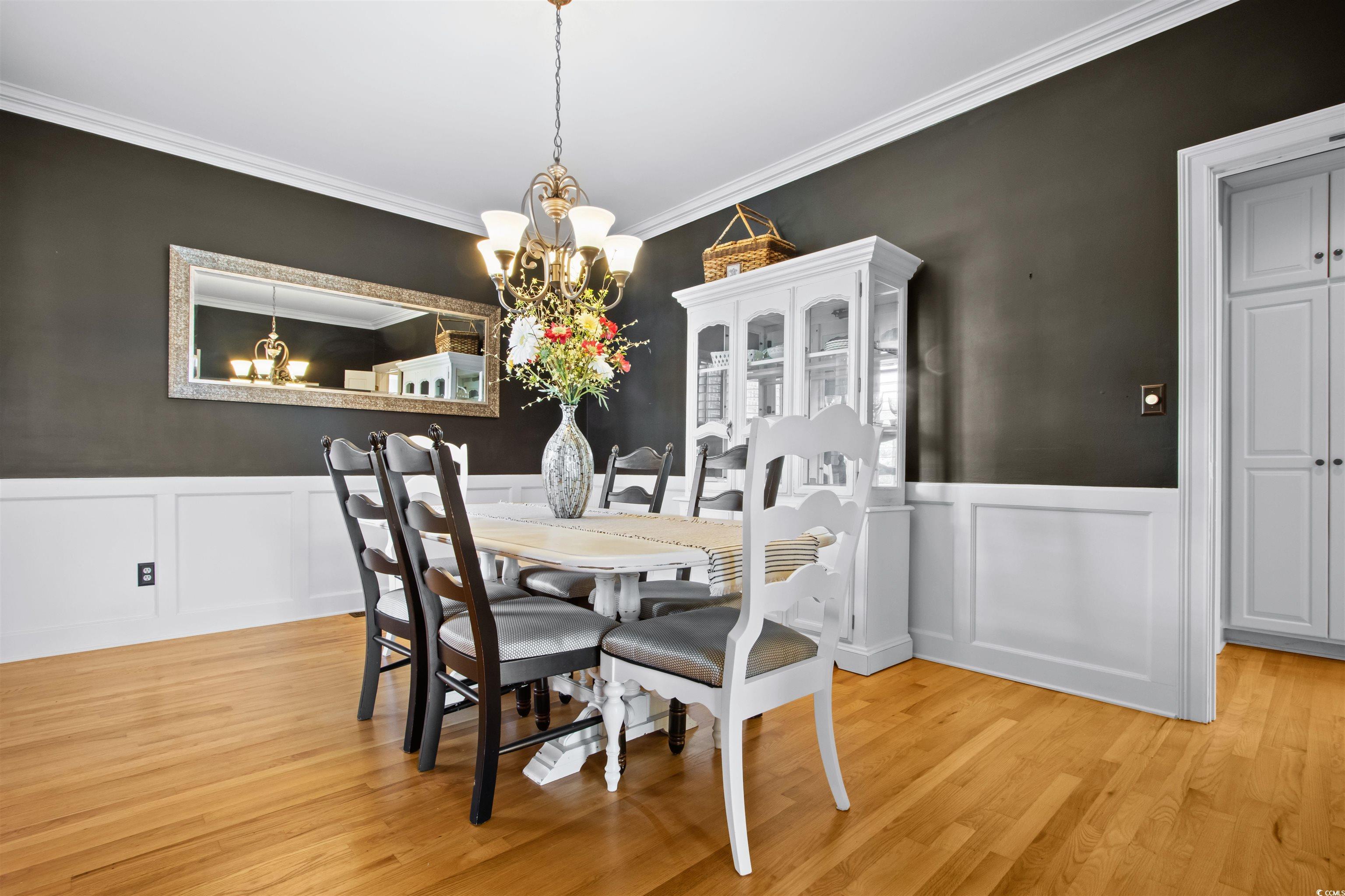 1035 Gullane Court Myrtle Beach, SC 29575 - Photo 9 of 40 Dining space with light hardwood / wood-style floo