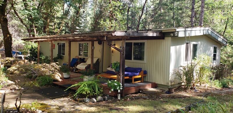 800 Covered Bridge Road Rogue River, OR 97537 - Photo 25 of 25 a view of a house with patio